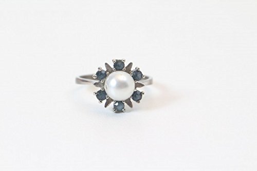 Silberfarbender Ring mit 6 Saphiren