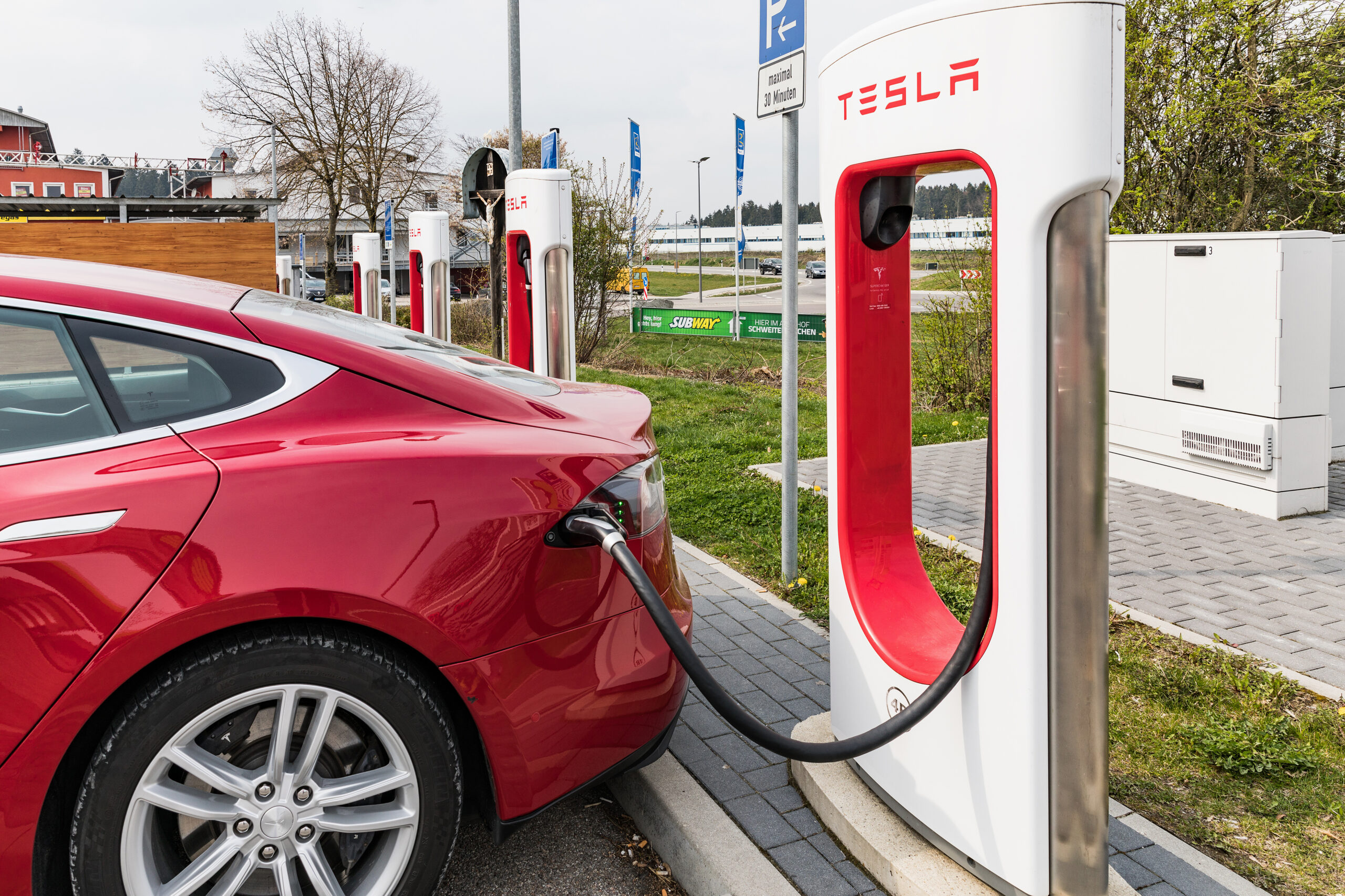 Euro Rastpark Pfaffenhofen, GERMANY - April 9, 2019 Charging TESLA cars at the charging station. Tesla Moles S 70D, Tesla supercharge station with a car on charging. Stockfoto-ID: 297106498 Copyright: Nadege, Bigstockphoto.com