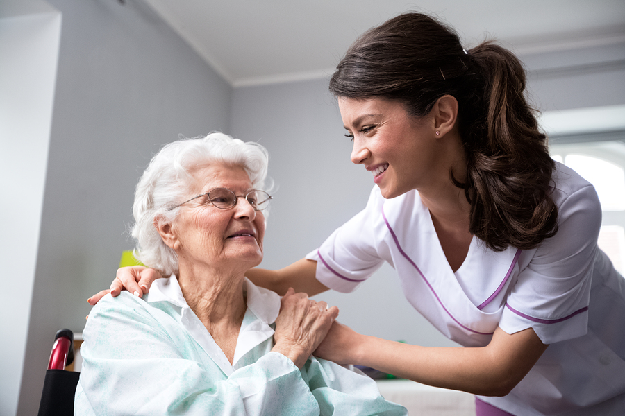bigstock Smiling Nurse And Old Woman Pa 225849046 1